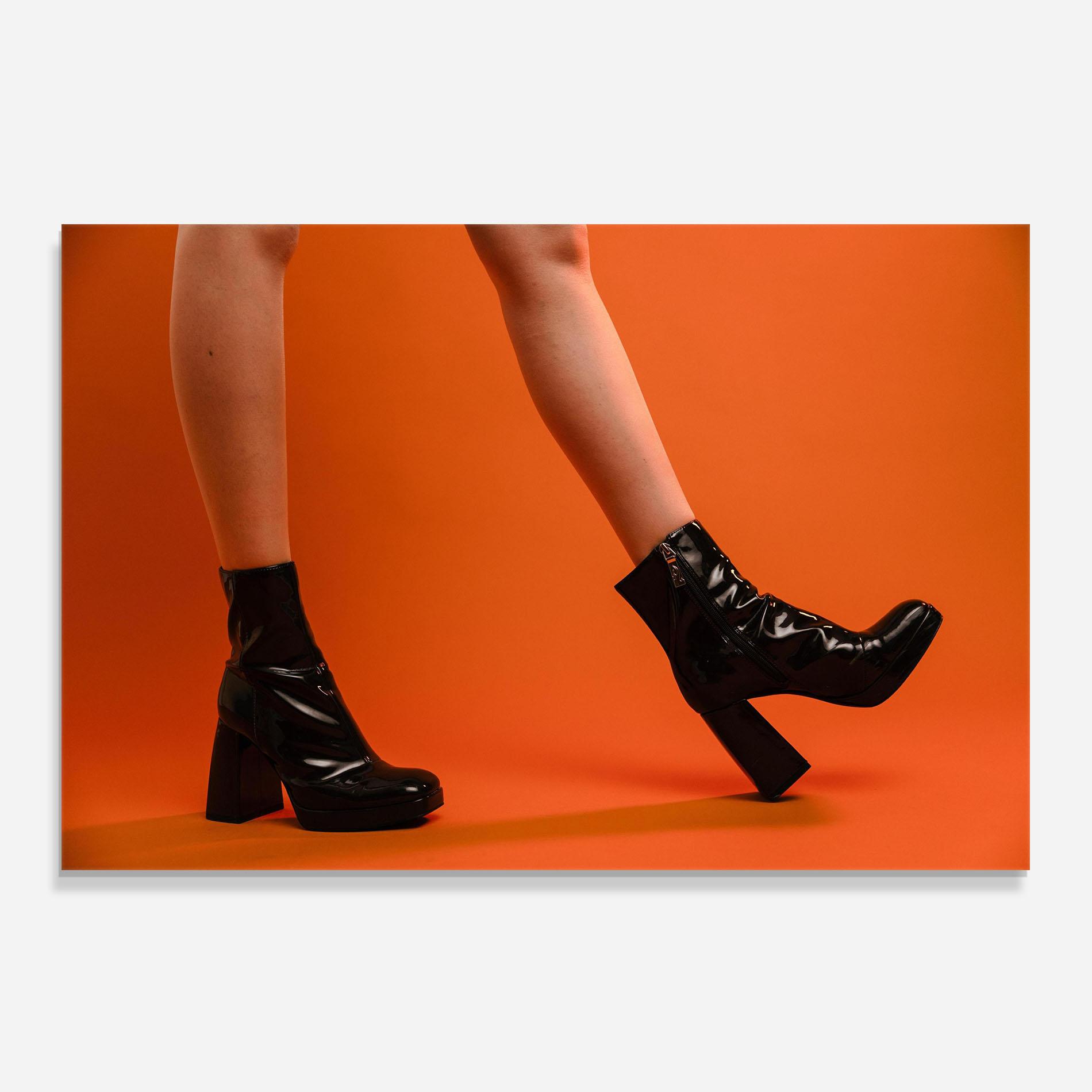 Konyhai üveg hátfal Black Boots On Orange mockup 0
