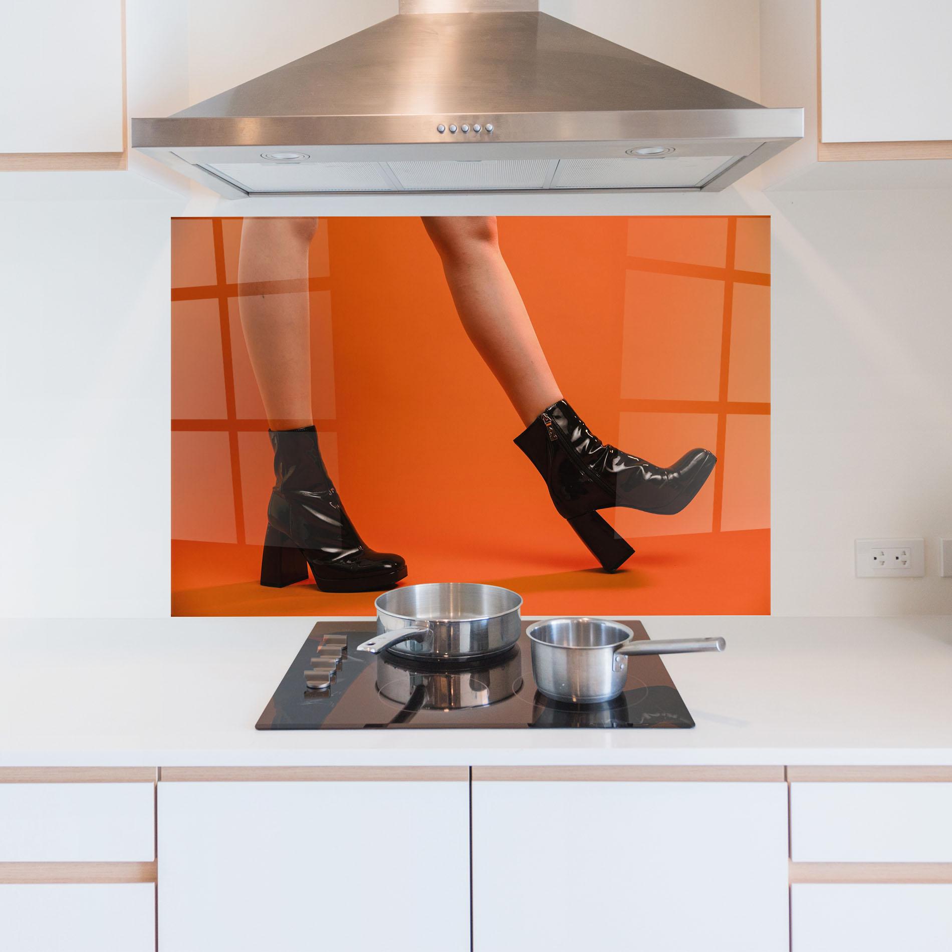 Konyhai üveg hátfal Black Boots On Orange mockup 5