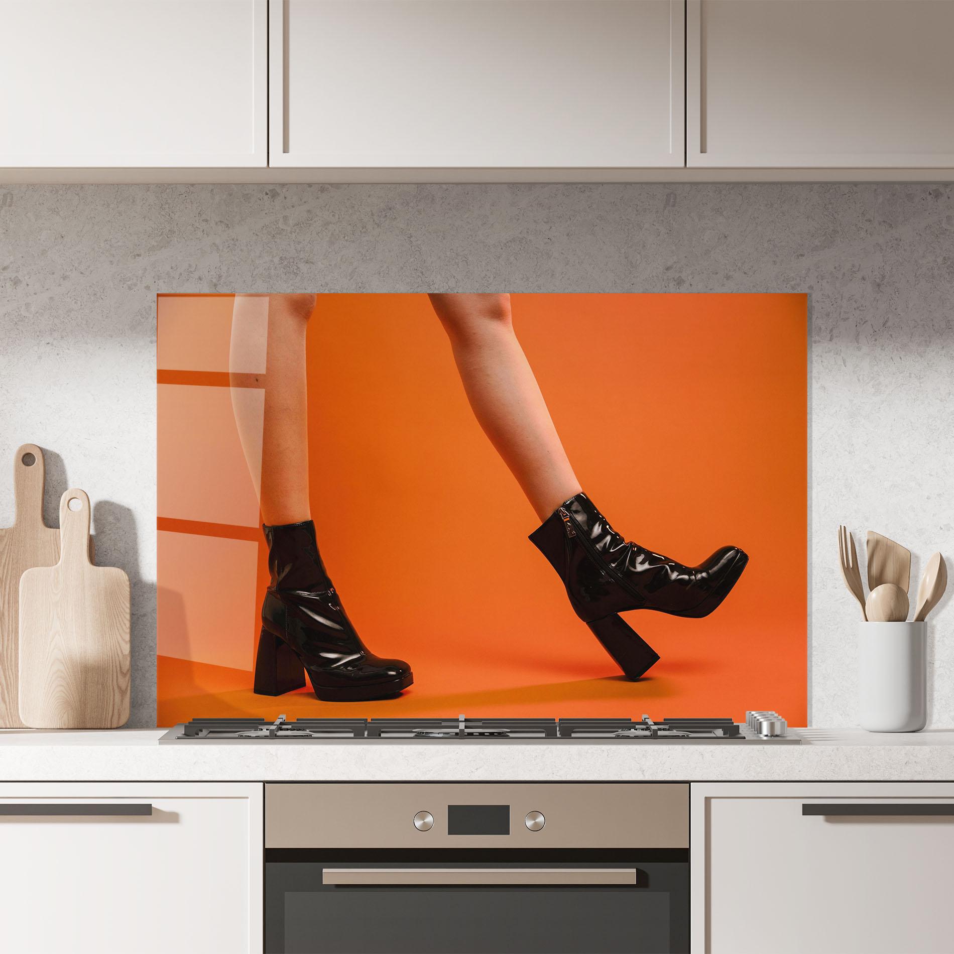 Konyhai üveg hátfal Black Boots On Orange mockup 7